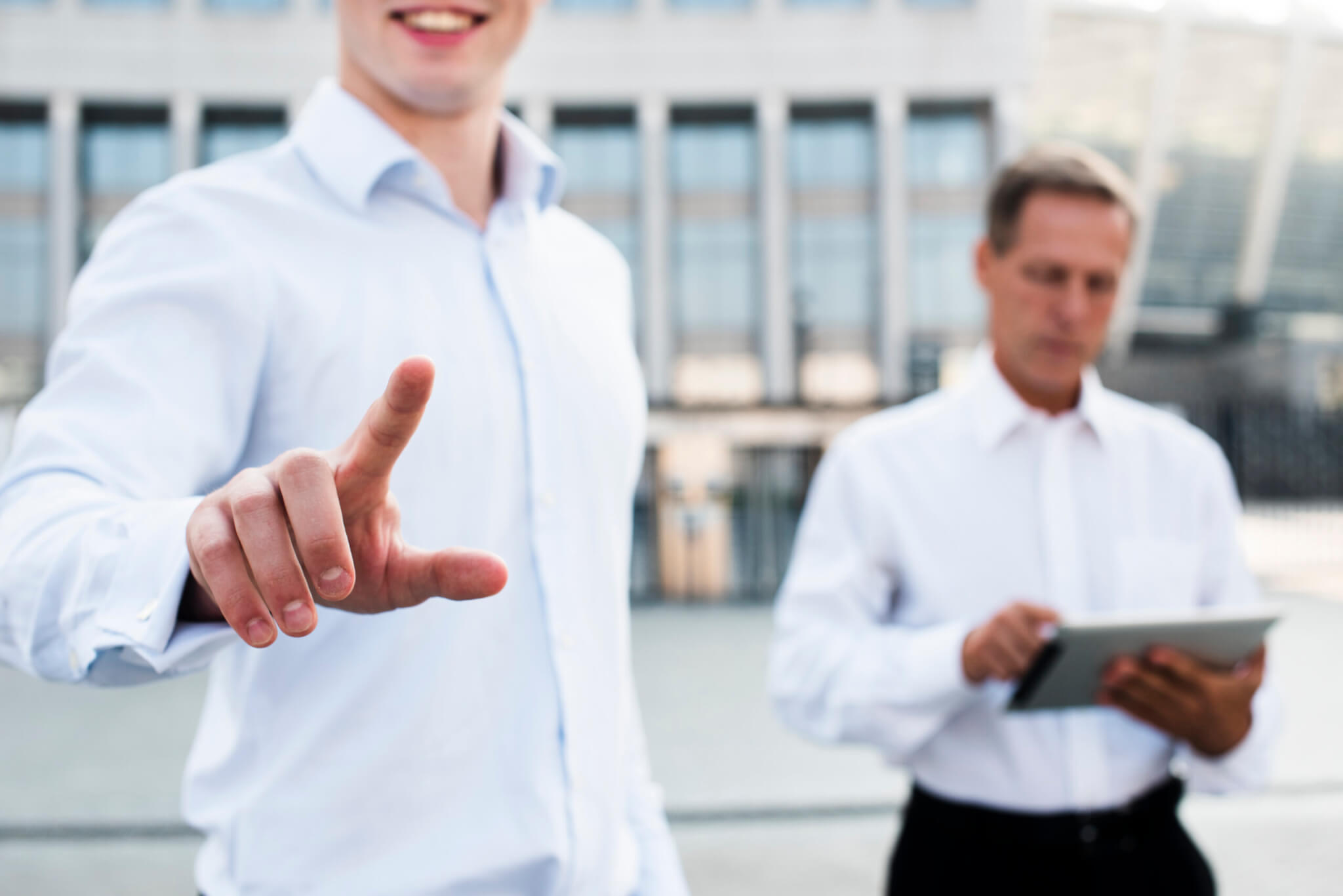 businessman-showing-two-gesture